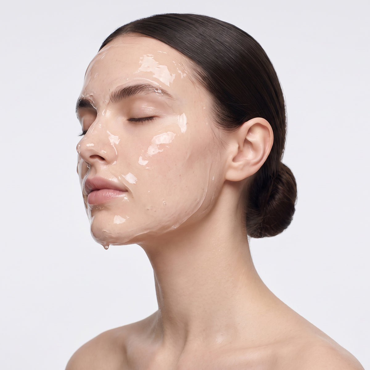 Woman with conductive gel applied across her face