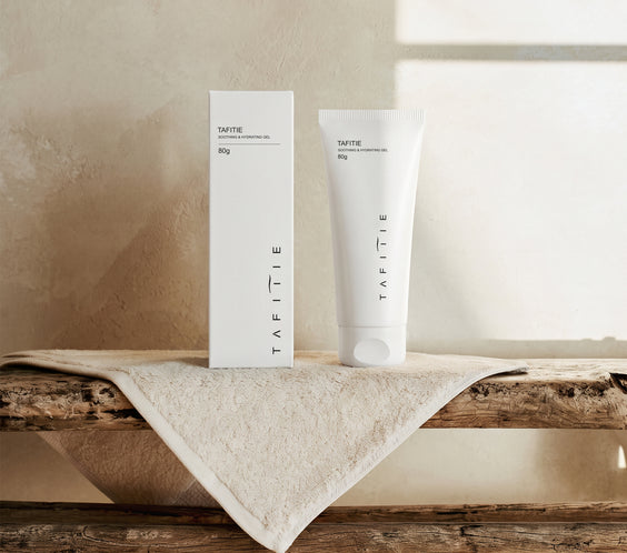 TAFITIE ultrasound conductive gel tube and box on a wooden shelf with linen towel